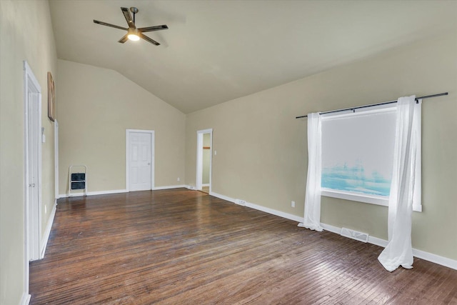 interior space with lofted ceiling, visible vents, a ceiling fan, wood finished floors, and baseboards