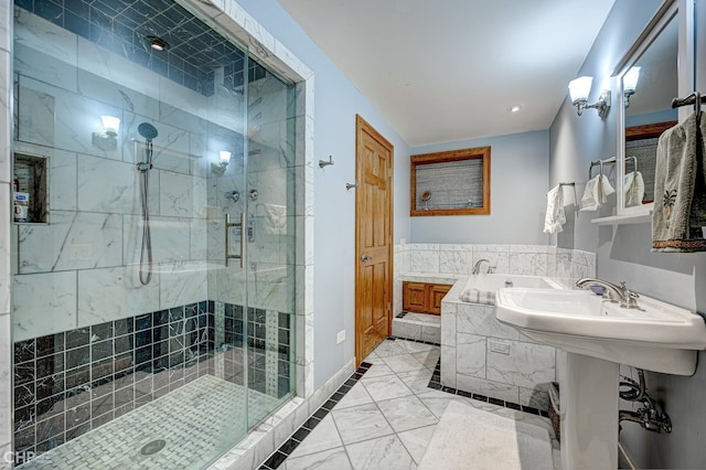 full bathroom with a stall shower, baseboards, and a bath