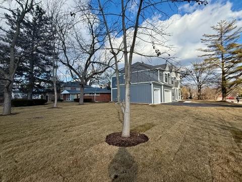 view of home's exterior featuring a yard