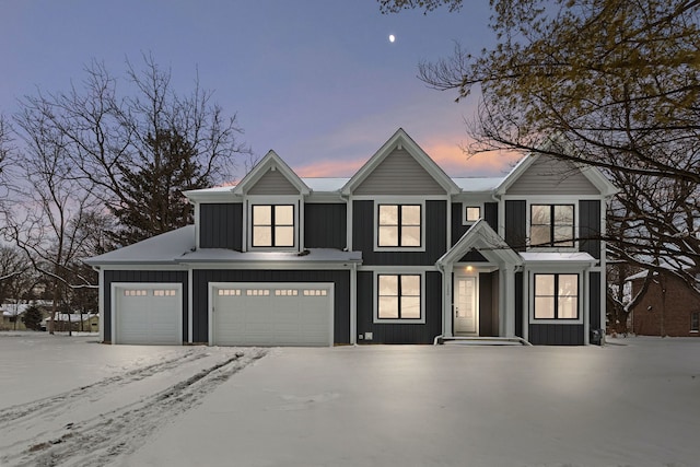 view of front facade featuring board and batten siding and an attached garage