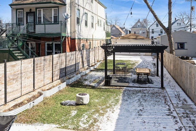 view of yard with a fenced backyard, a residential view, and a pergola