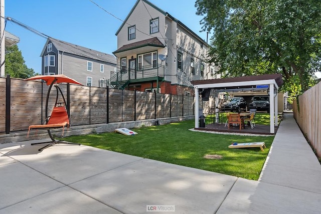 exterior space with a lawn and a fenced backyard