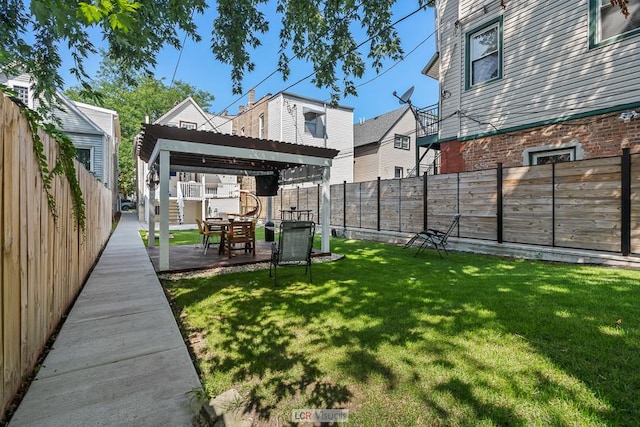 view of yard featuring a fenced backyard, a pergola, and a patio