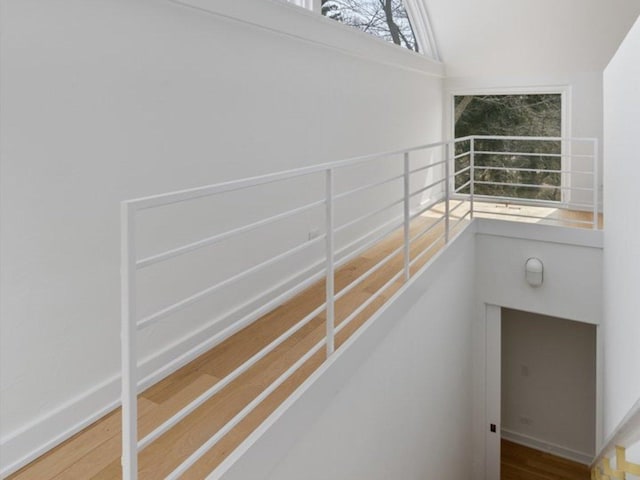 stairs with wood finished floors