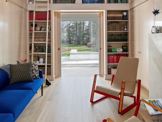 sitting room featuring wood finished floors