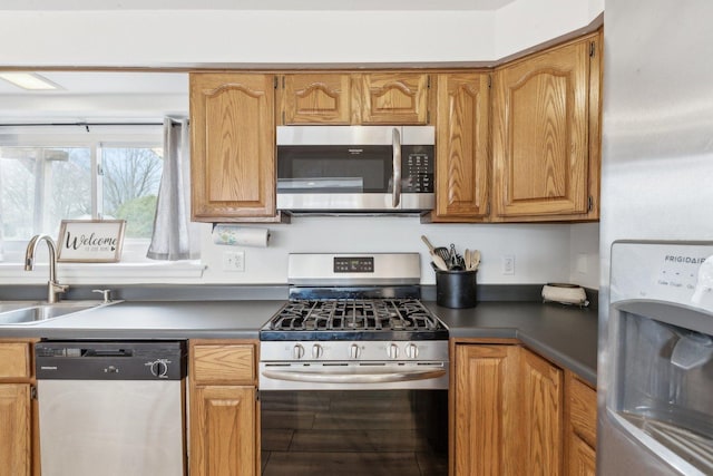 kitchen featuring a sink and appliances with stainless steel finishes