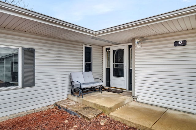 entrance to property with covered porch