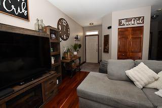 living area with wood finished floors