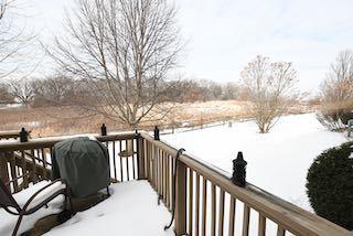 view of snow covered deck