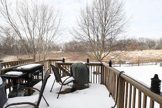 view of snow covered deck