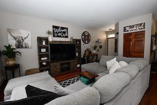 living room with wood finished floors