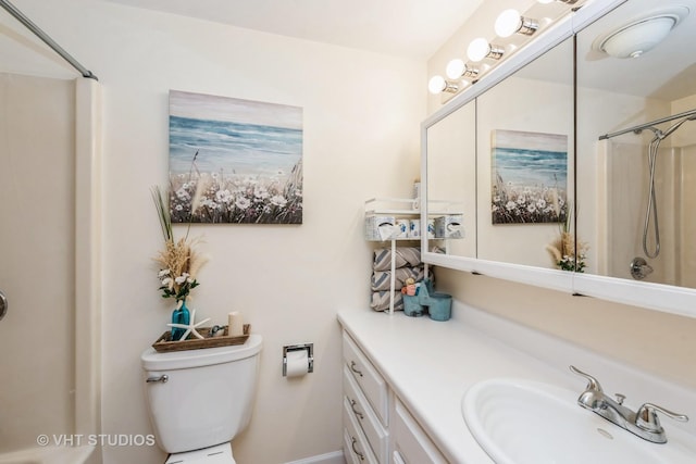 bathroom featuring toilet, a shower with shower curtain, and vanity