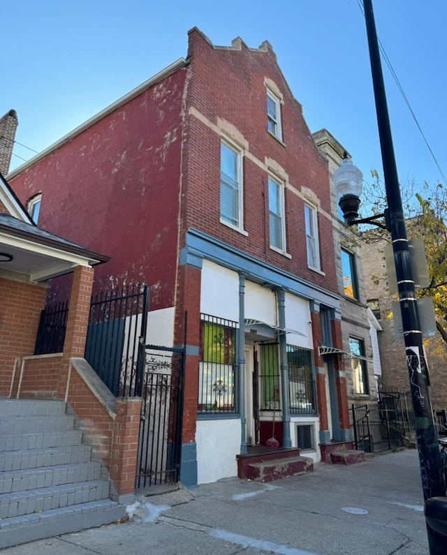 view of front of property with brick siding