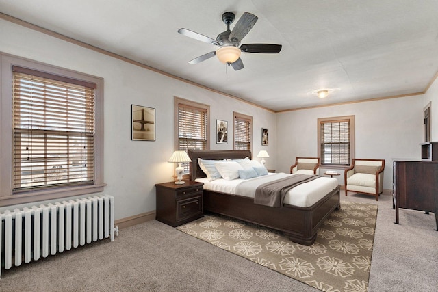 bedroom with light carpet, ornamental molding, baseboards, and radiator