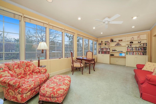 interior space featuring light carpet, ceiling fan, recessed lighting, and crown molding