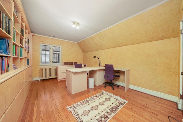 office with baseboards, ornamental molding, light wood-type flooring, and radiator