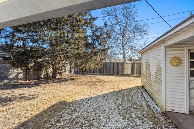 view of yard with a fenced backyard