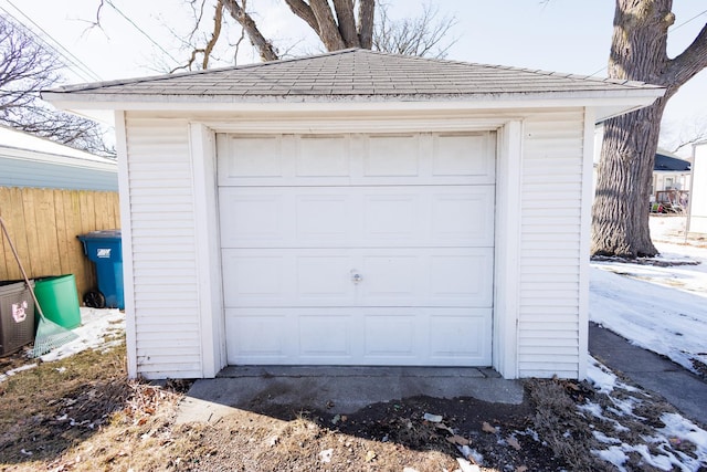 garage with fence