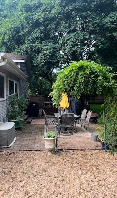 view of yard featuring a patio area and fence