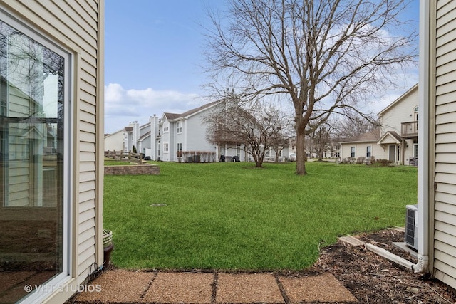 view of yard featuring a residential view