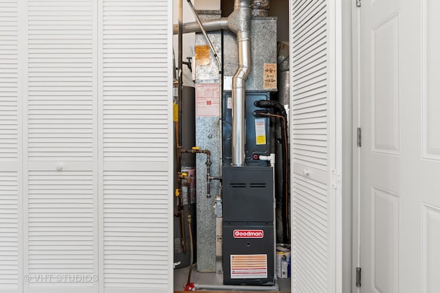 utility room with heating unit