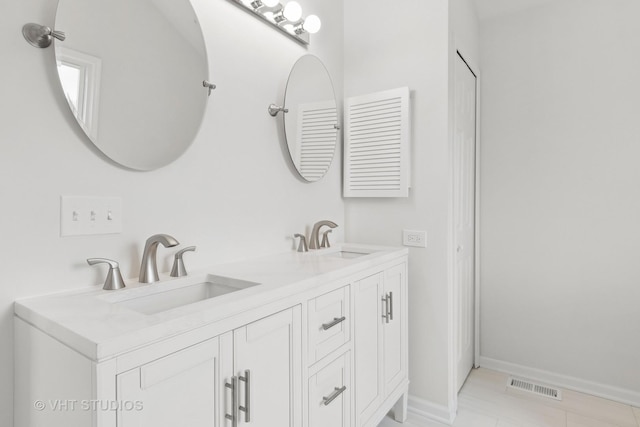 full bath featuring tile patterned flooring, visible vents, a sink, and double vanity