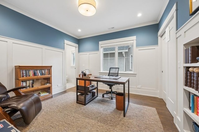 office area featuring crown molding, recessed lighting, dark wood-style flooring, and a decorative wall