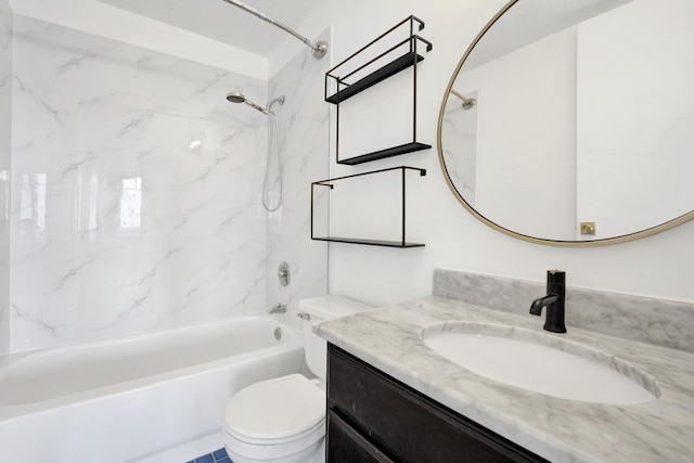 bathroom with shower / tub combination, vanity, and toilet