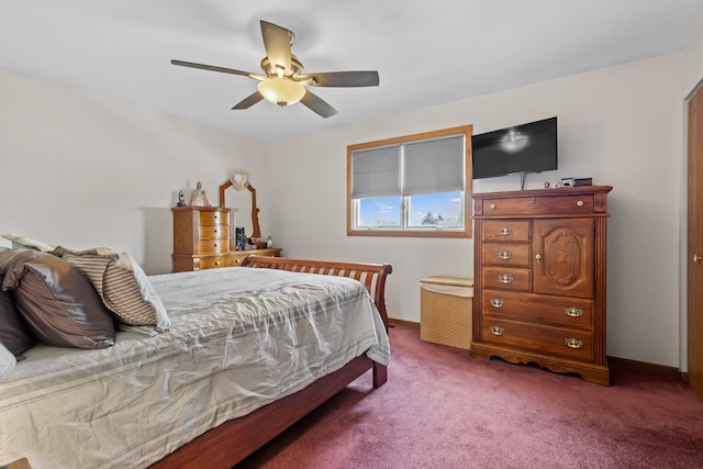 bedroom with carpet, a ceiling fan, and baseboards