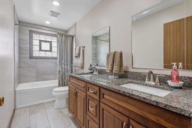 bathroom with shower / tub combo, visible vents, a sink, and double vanity