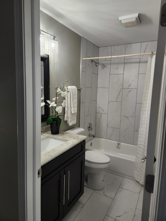 full bath featuring marble finish floor, vanity, toilet, and shower / tub combo with curtain