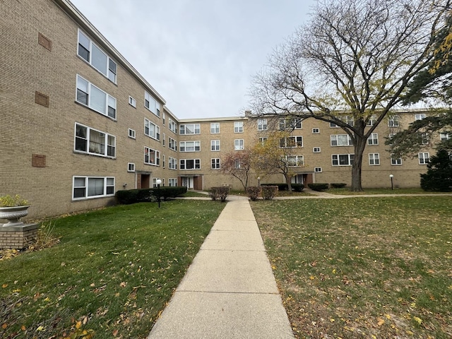 view of community with a yard