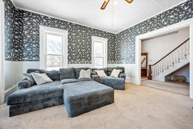 carpeted living room featuring a wealth of natural light and wallpapered walls