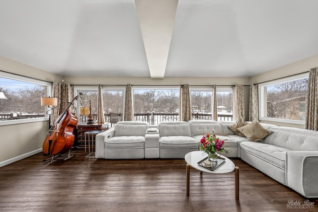 sunroom / solarium with vaulted ceiling with beams and plenty of natural light