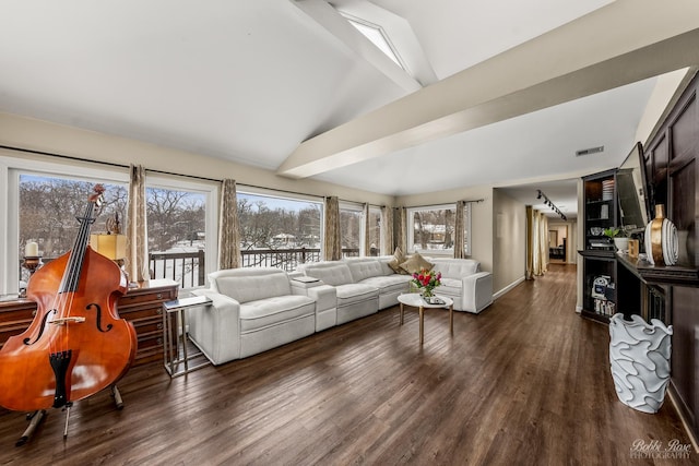 living area featuring vaulted ceiling, dark wood-style floors, visible vents, and a healthy amount of sunlight