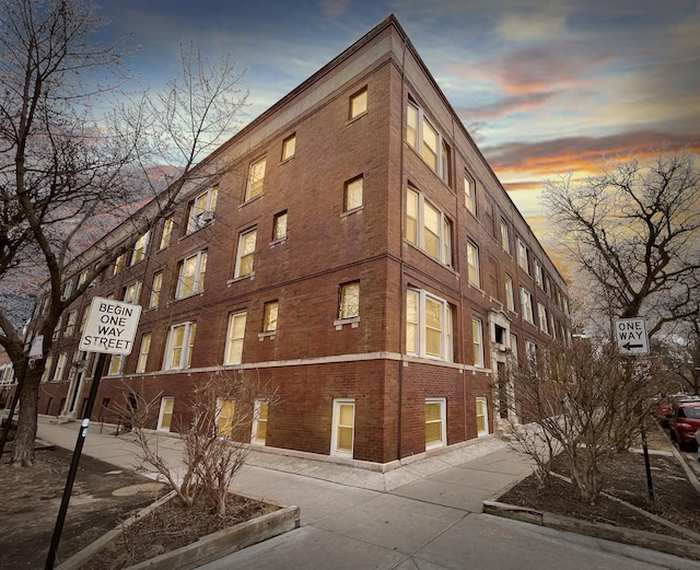 view of property at dusk