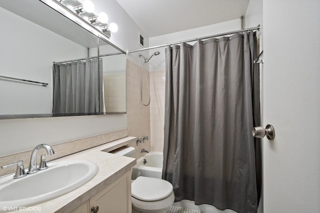 full bathroom featuring vanity, toilet, and shower / tub combo with curtain