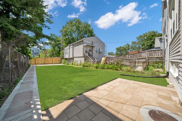 view of yard with a patio area and a fenced backyard