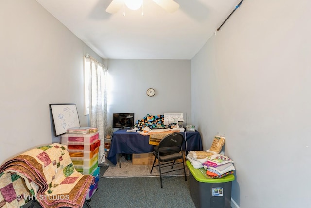 carpeted home office with ceiling fan