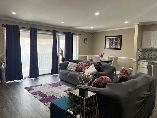 living room featuring recessed lighting, crown molding, and wood finished floors