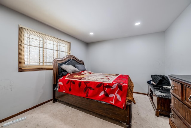 bedroom featuring light carpet, baseboards, and recessed lighting