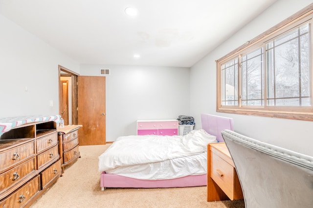 bedroom with light carpet, multiple windows, visible vents, and recessed lighting