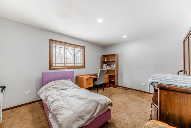 bedroom featuring baseboards, recessed lighting, and light colored carpet