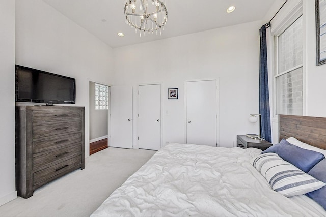 bedroom with recessed lighting, baseboards, carpet, and an inviting chandelier