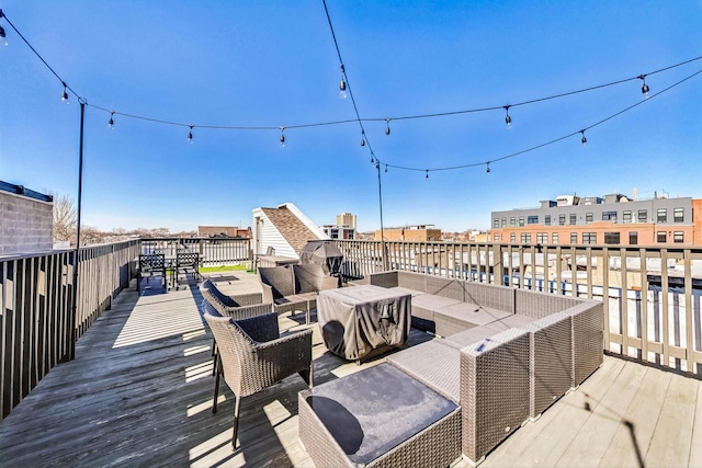 wooden deck featuring an outdoor hangout area