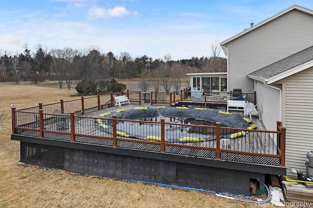 wooden deck with a sunroom