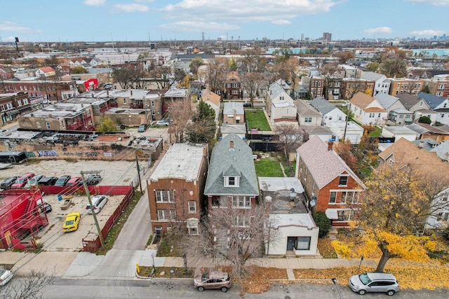 birds eye view of property with a residential view