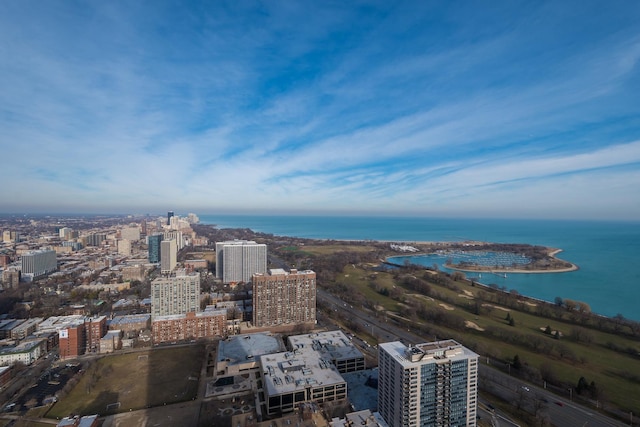 aerial view featuring a view of city and a water view