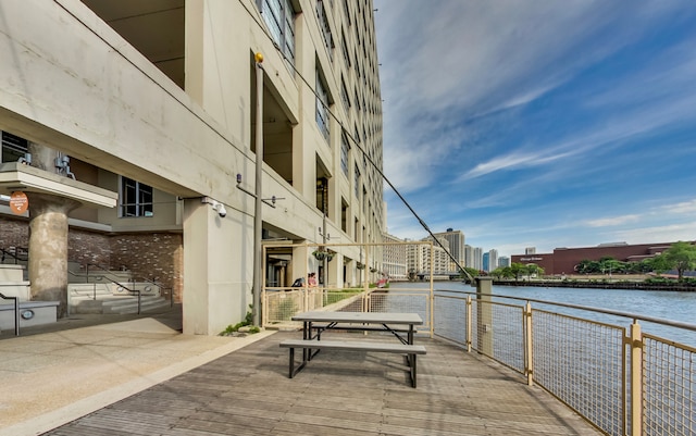 dock area with a water view and a city view