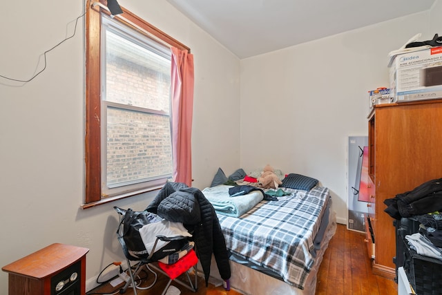 bedroom with wood-type flooring